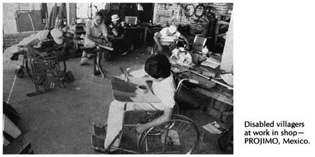 Disabled villagers at work in shop.
