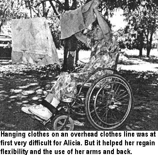 Hanging clothes on an overhead clothes line was at first very difficult for Alicia. But it helped her regain flexibility and the use of her arms and back.