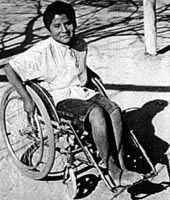 A wheelchair adapted to his size and needs.