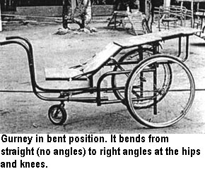 Gurney in bent position. It bends from straight (no angles) to right angles at the hips and knees.