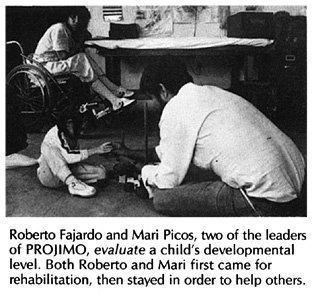 Roberto Fajardo and Mari Picos, two of the leaders of PROJIMO, evaluate a child's developmental level.