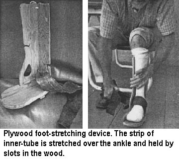 Plywood foot-stretching device. The strip of inner-tube is stretched over the ankle and held by slots in the wood.