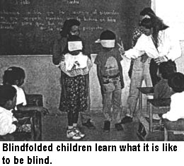 Blindfolded children learn what it is like to be blind.